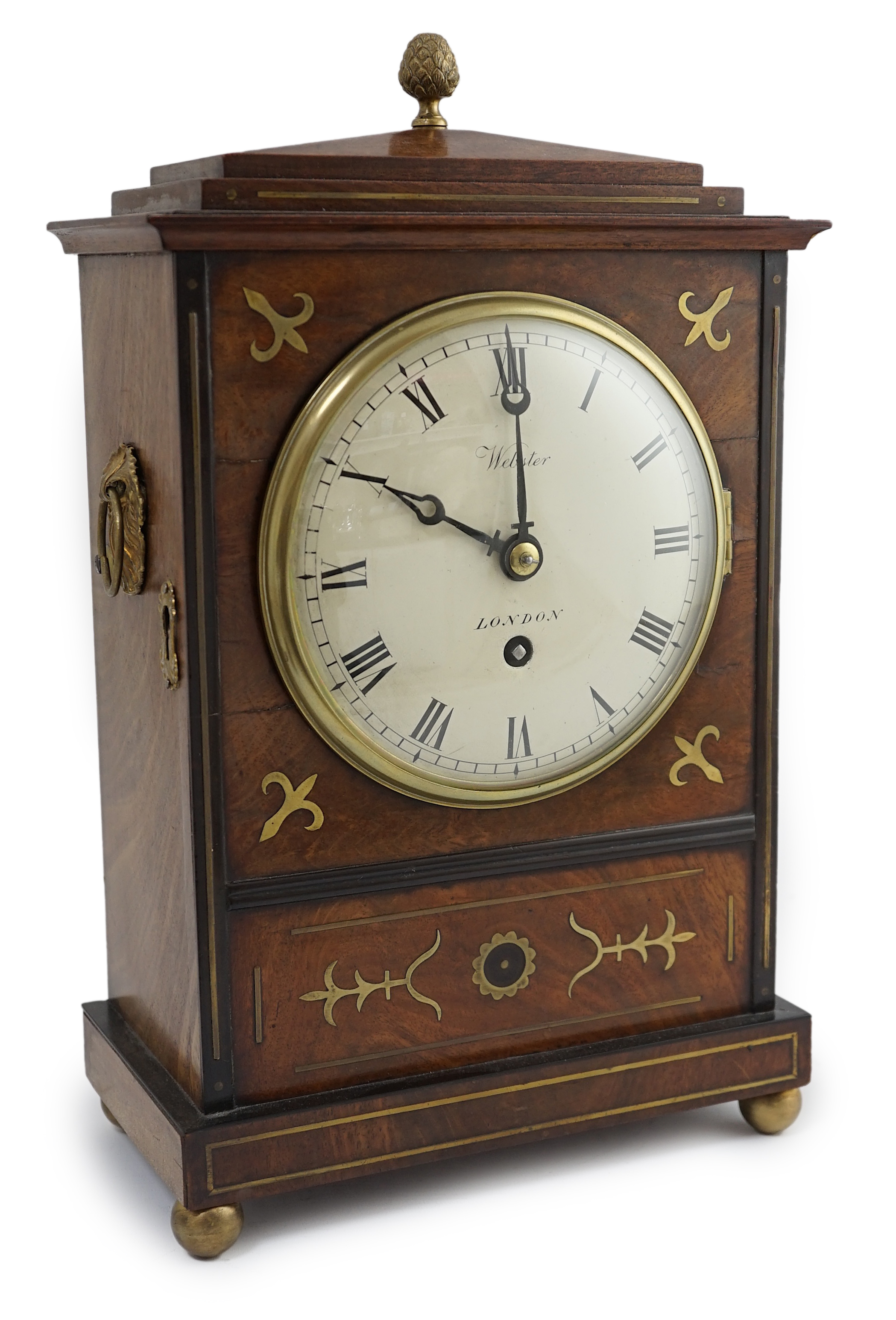 Webster of London. A Regency brass inset and ebonised mahogany bracket timepiece